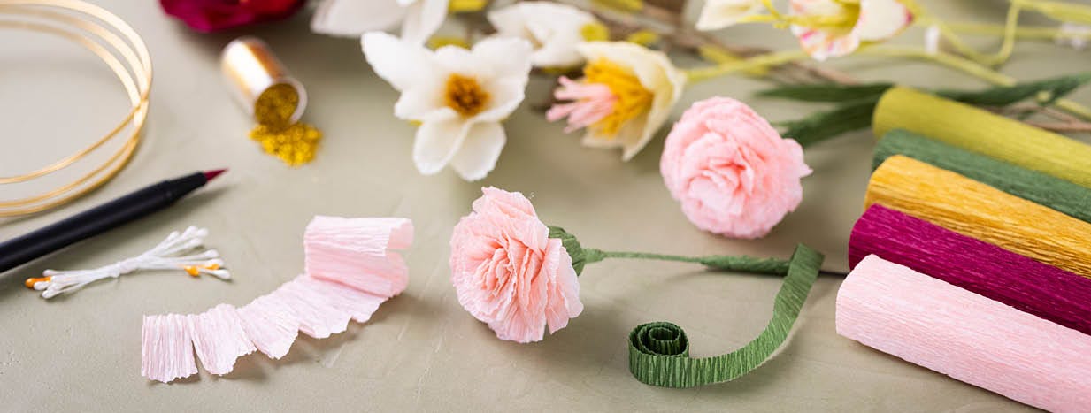 Gifts with green crepe paper wreaths