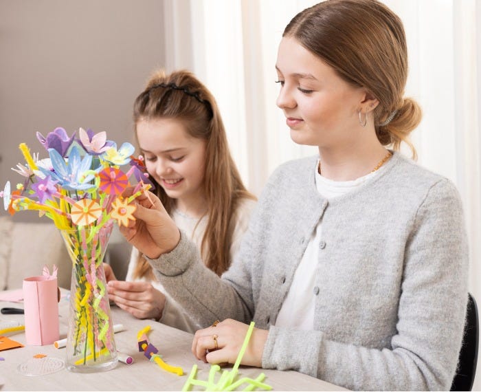 Young girl assemble an Easter bouquet