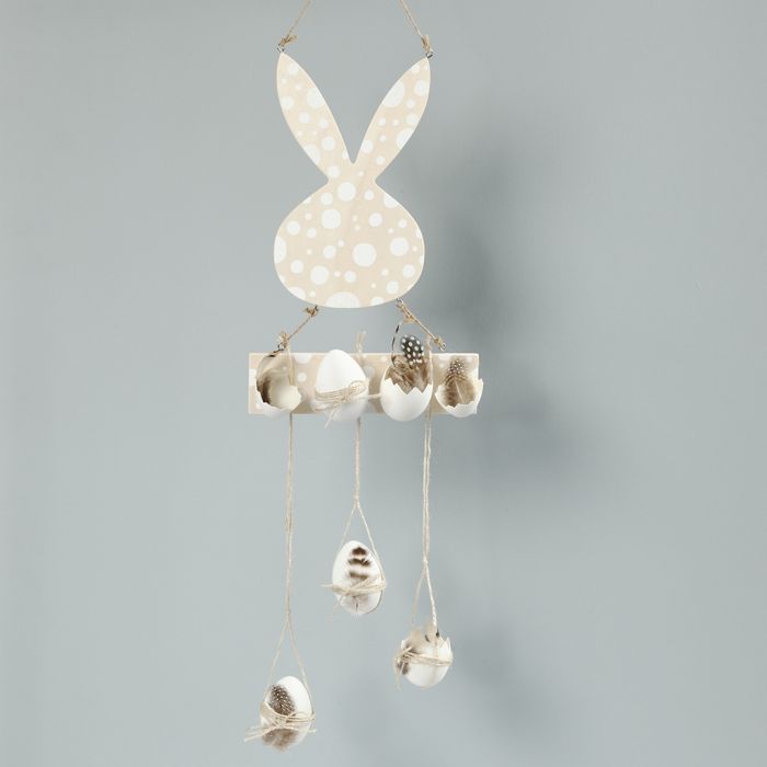 An Easter hanging decoration with eggs and feathers