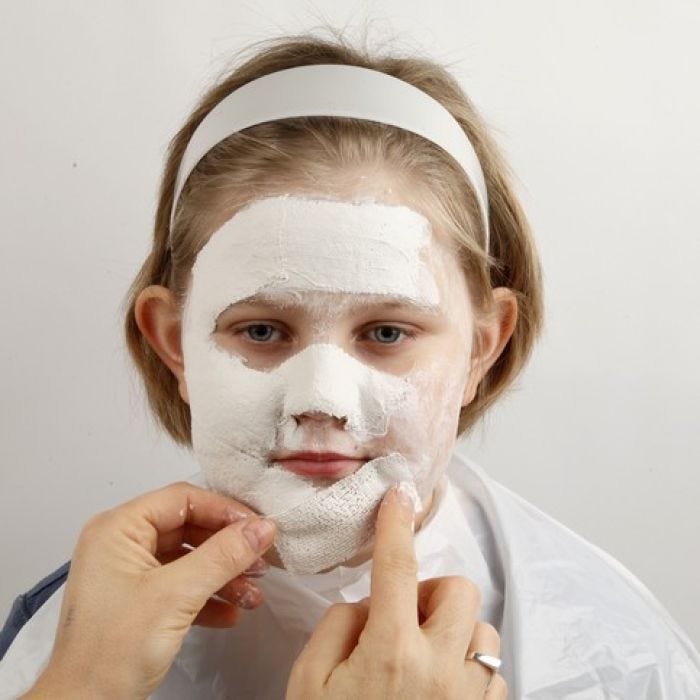 Masque facial en bandage de gaze