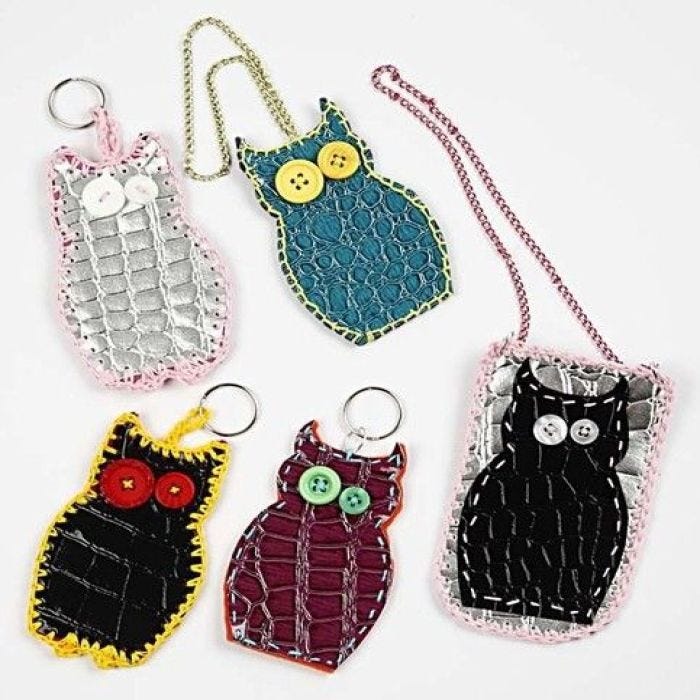 Owls and Mobile Phone Bags in Snakeskin