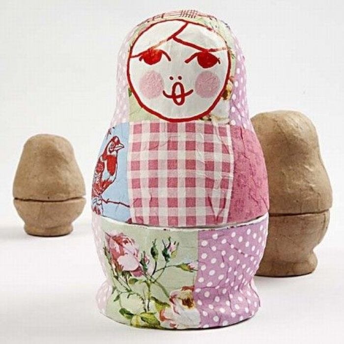 A Russian Babushka Doll with Napkins