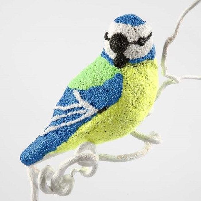 A Papier-Mâché Bird covered with Foam Clay