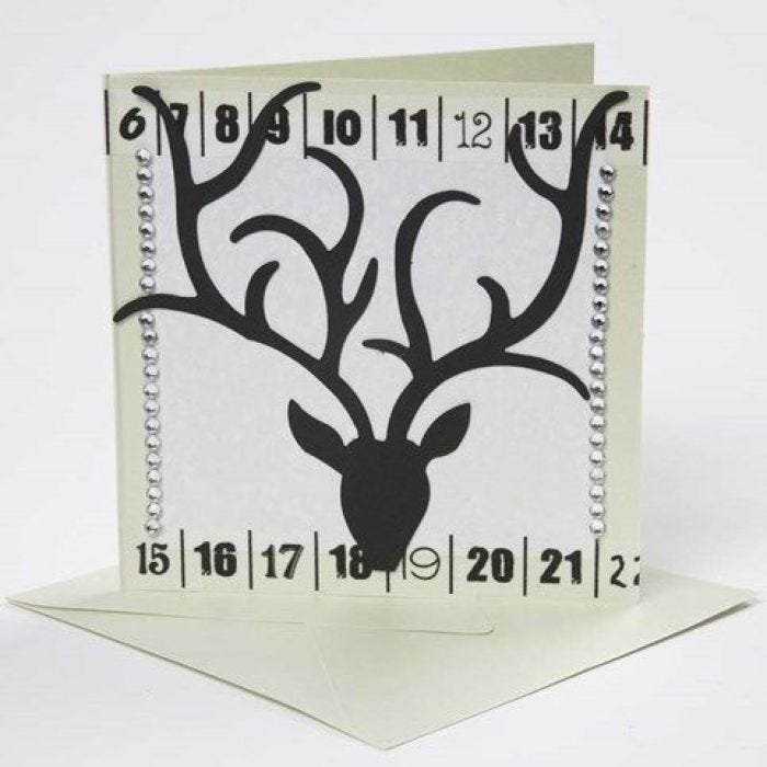 A Greeting Card with a Silhouette, Rhinestones and Masking Tape
