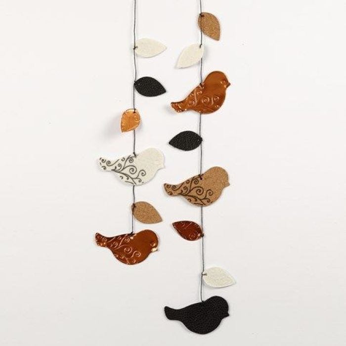 A die-cut Mobile, with embossed and printed Birds