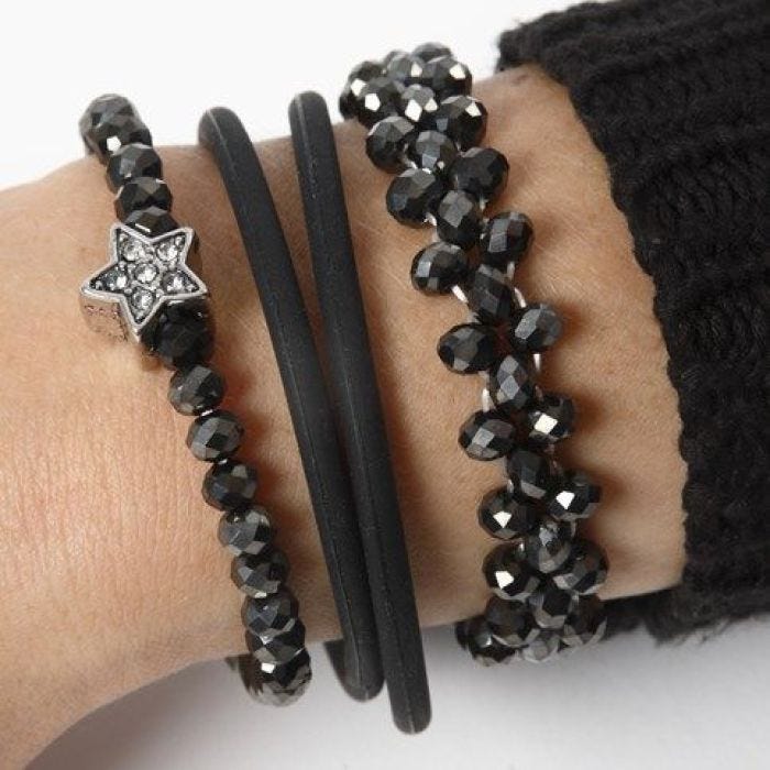 A Bracelet made from Faceted Beads, decorated with a Fashion Link