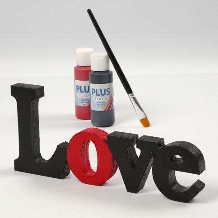 A painted and varnished decorative Word - “Love”