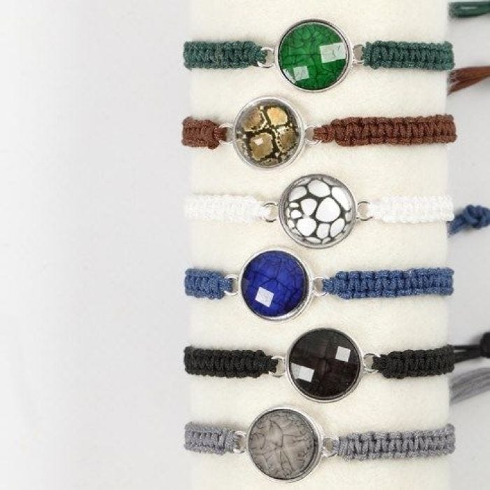 A braided Bracelet with a Cabochon in a Spacer Bead