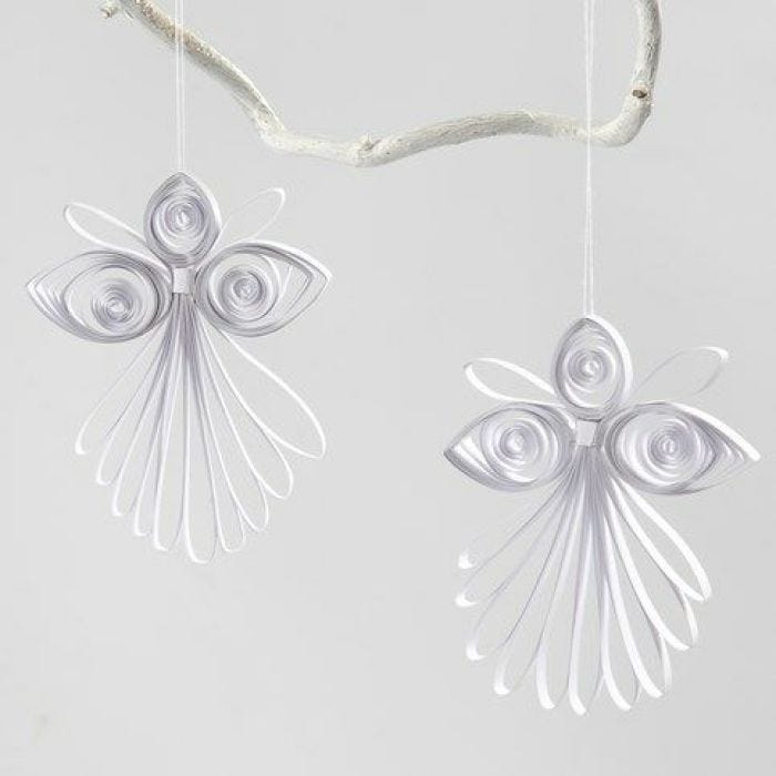 A quilled Angel made from white Quilling Paper Strips