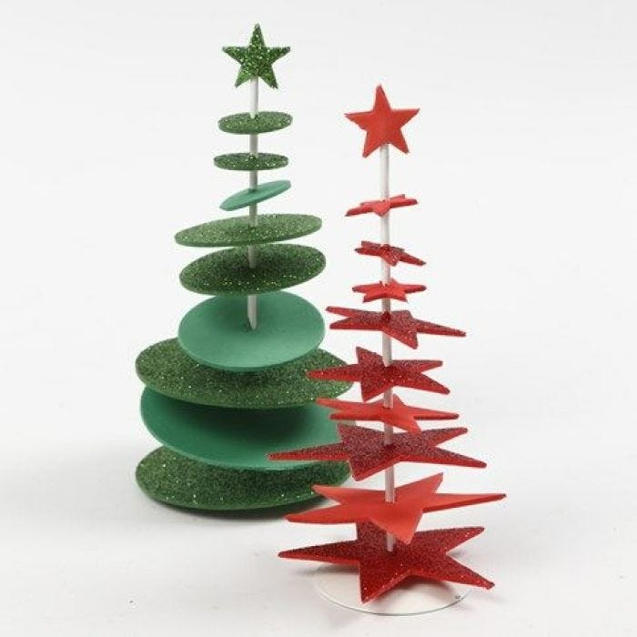 A punched-out Foam Rubber Christmas Tree on a Bar with a Stand