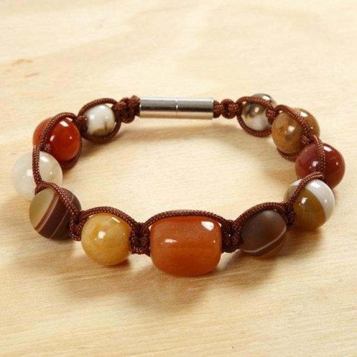 A braided Bracelet with luxury Beads and a magnetic Clasp