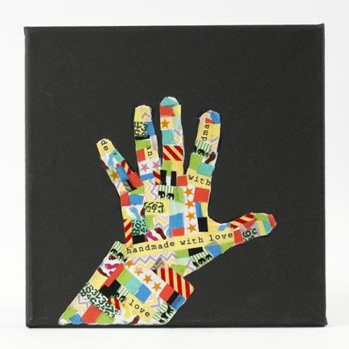 A black Canvas with a Silhouette Hand from patterned Masking Tape