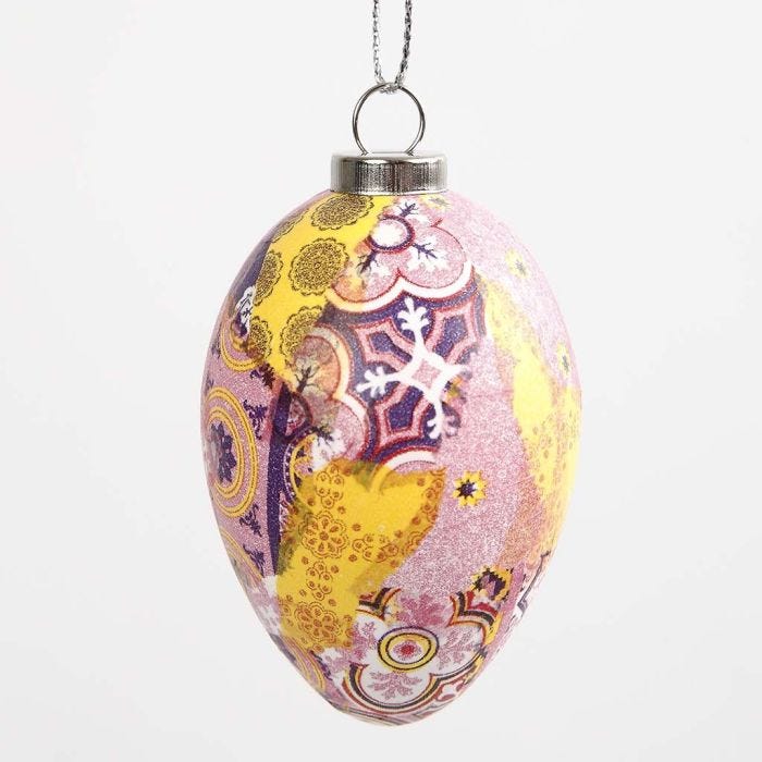 An Egg with patterned Decoupage in pink Harmony