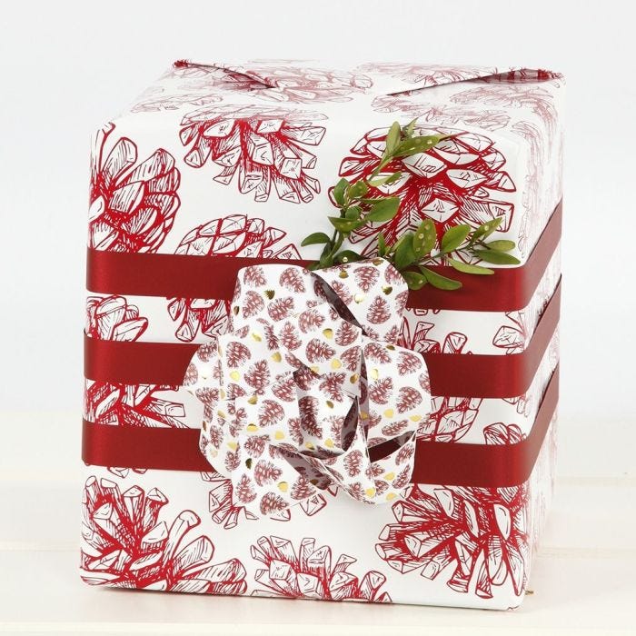 Gift Wrapping with a large Bow from Paper Star Strips