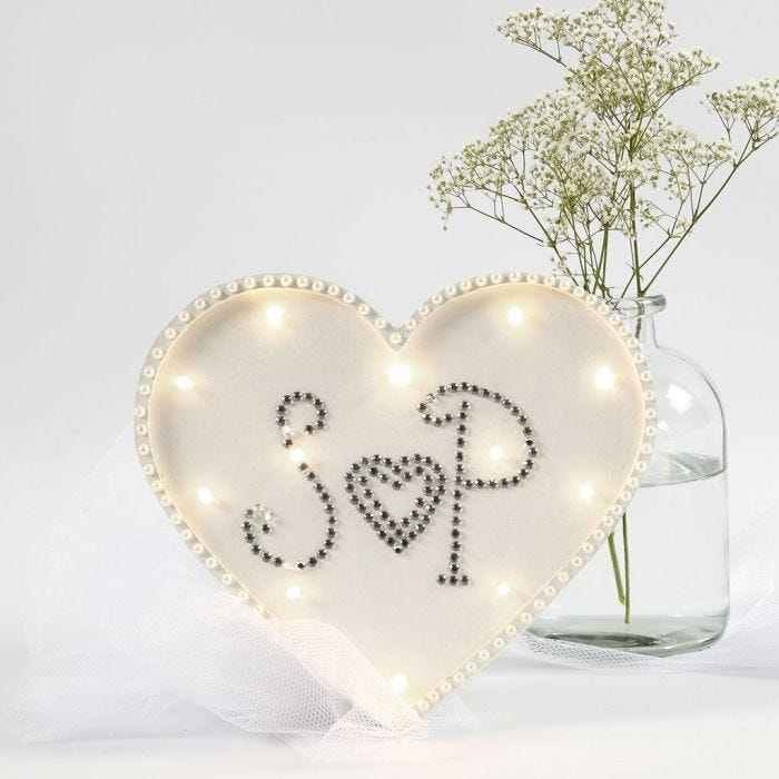 A heart-shaped Light Box decorated with Rhinestones and Half-Pearls