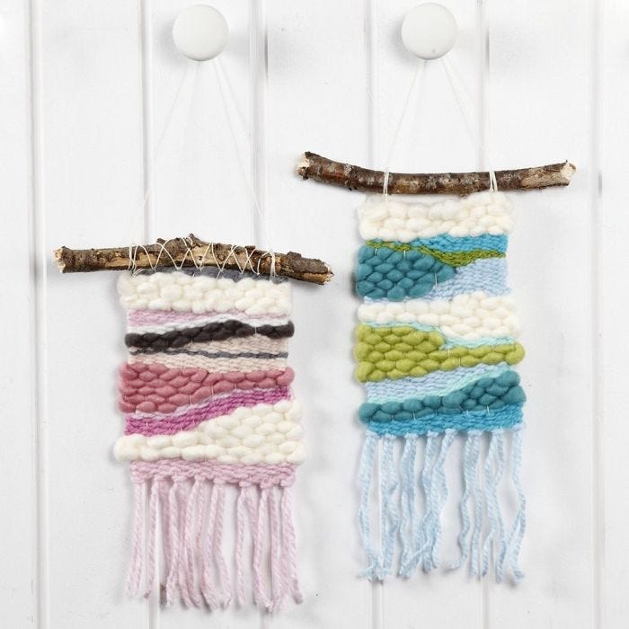 A woven Wall Hanging with Acrylic Manga XL Yarn