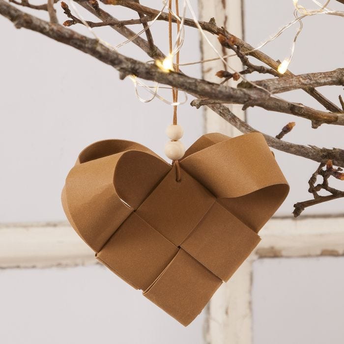 A woven Faux Leather Paper Christmas Heart Basket