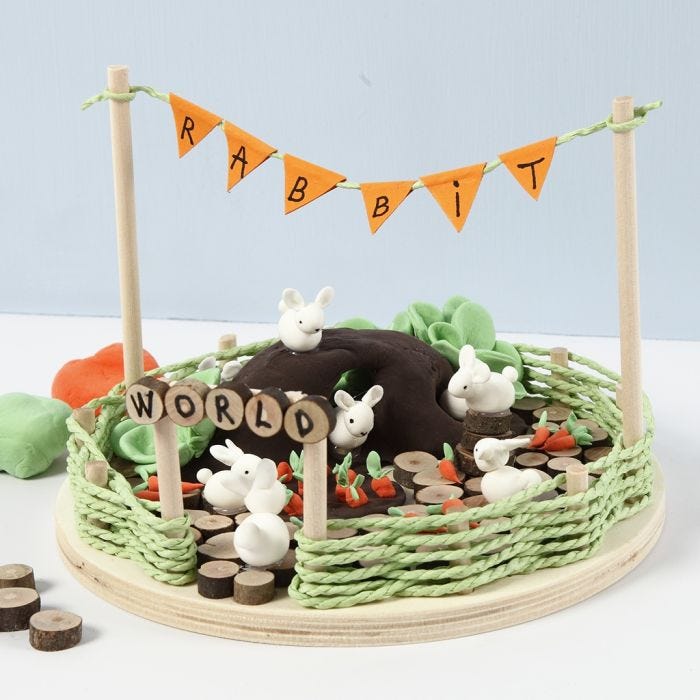 A Miniature World with Silk Clay Rabbits and Carrots