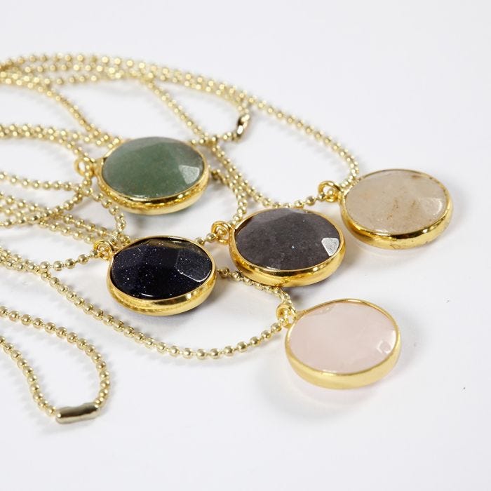 A Bead Chain Necklace and Jewellery Pendant with a Stone