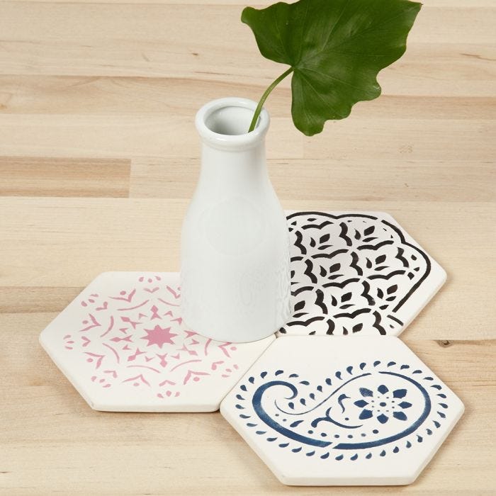 Terracotta Art Tiles decorated with stencilled Ethnic Designs