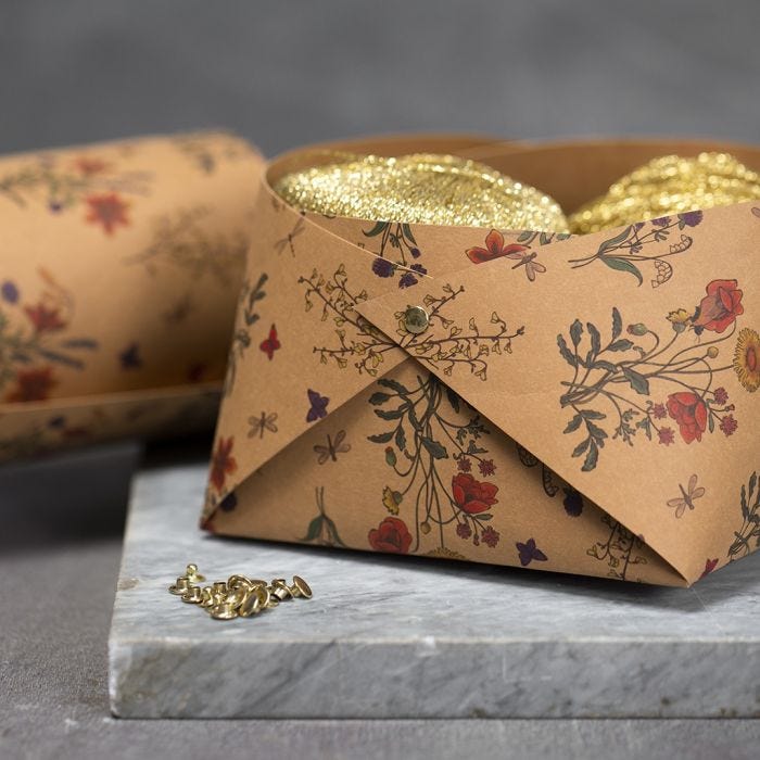 A Faux Leather Paper Bowl assembled with Rivets