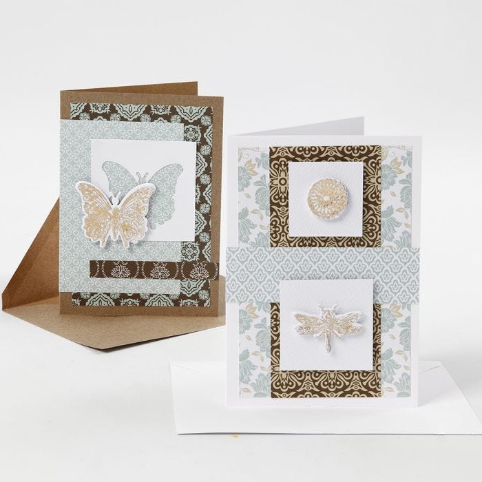 Greeting Cards decorated with Design Paper and punched-out Designs with Deco Foil