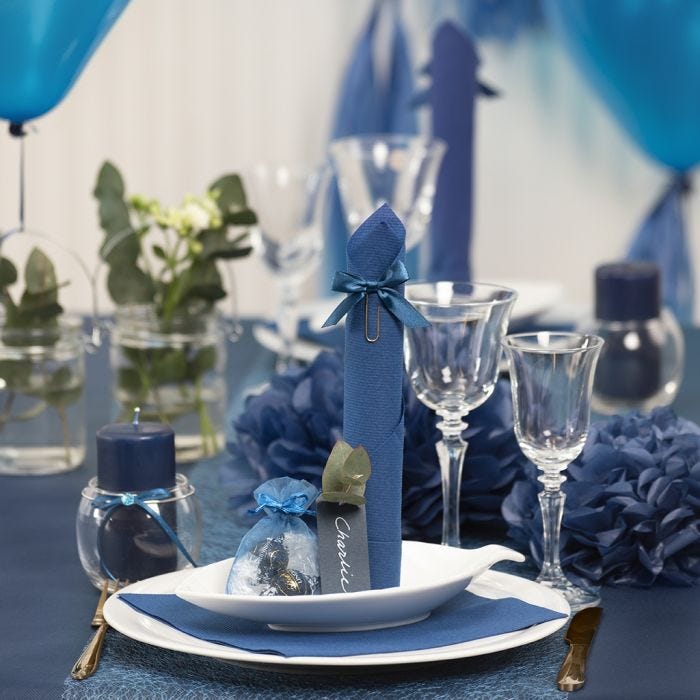 Dark blue Table Decorations with Paper Flowers, Balloons, a Napkin folded like a Tower and Place Cards