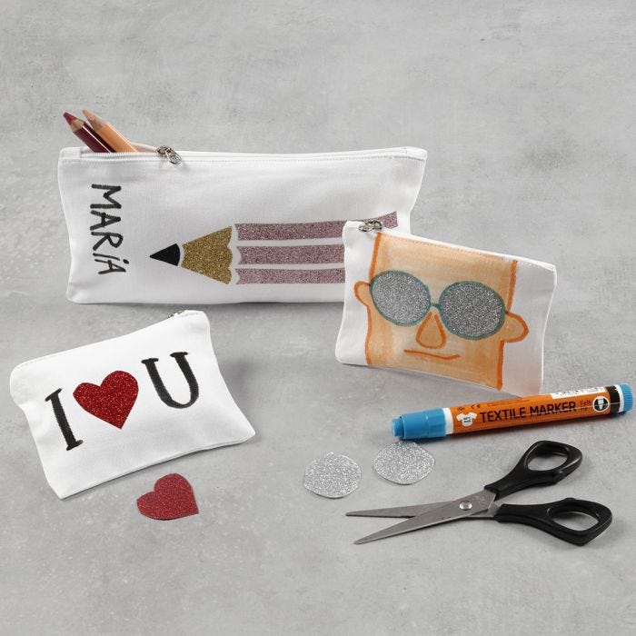 A Pencil Case and a Purse decorated with iron-on Foil and Textile Markers