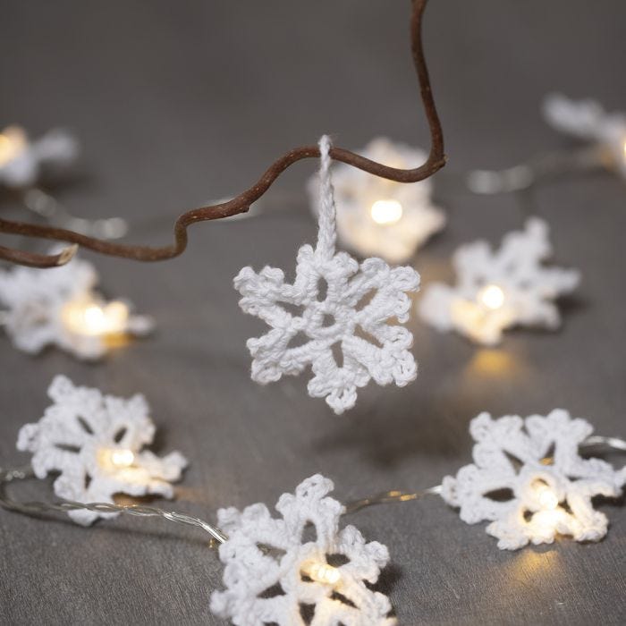 Snowflakes crocheted from cotton yarn