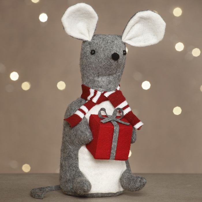 A felt Christmas mouse with a present