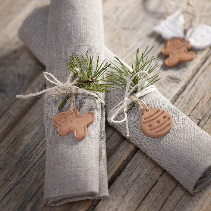 Christmas shapes from self-hardening clay for decoration or for hanging