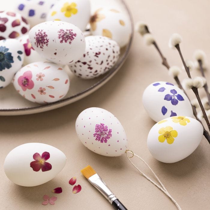 Eggs decorated with pressed and dried flowers