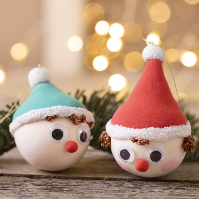 Christmas baubles shaped like elves made of Silk Clay® and Foam Clay®