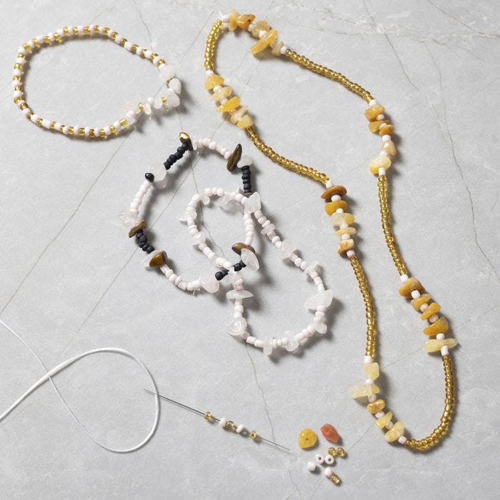 Jewellery with rose quartz, tiger’s eye and honey calcite