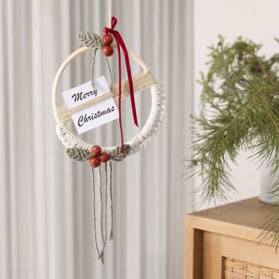 Knotted macramé Christmas wreath