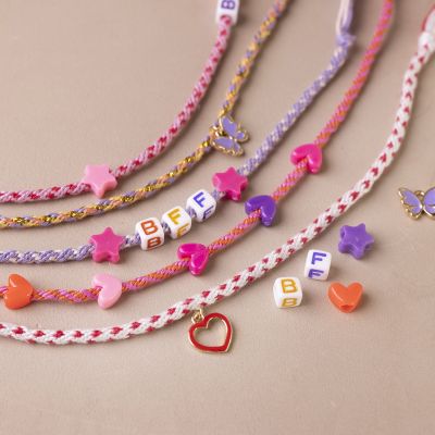 Friendship bracelet knotted using kumihimo technique