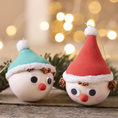 Christmas baubles shaped like elves made of Silk Clay® and Foam Clay®