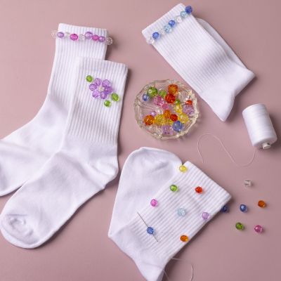 Socks decorated with beads