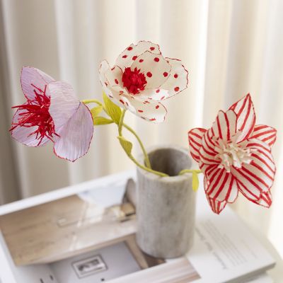 Crepe paper flowers decorated with creative multi markers
