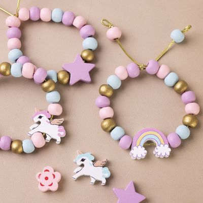 Elastic bracelet with wooden beads in pastel colours