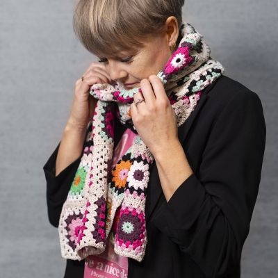 Crocheted granny square scarf