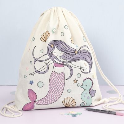 A Drawstring Bag with a pre-printed Mermaid Design decorated with Textile Markers and Sequins
