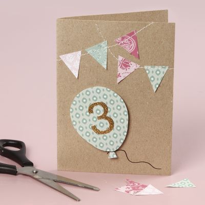 A birthday card with sewn-on details