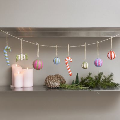 Colourful Christmas decorations made from papier-mâché pulp