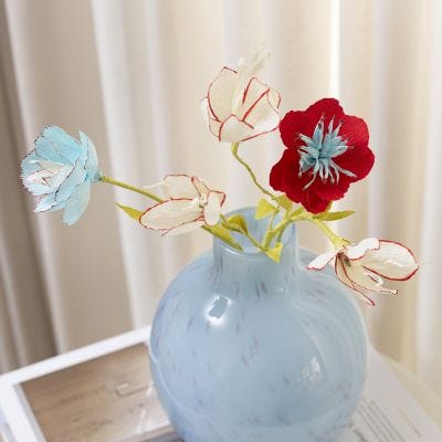 Crepe paper flowers decorated with markers