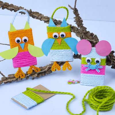 Wrapped animals with cardboard and acrylic yarn