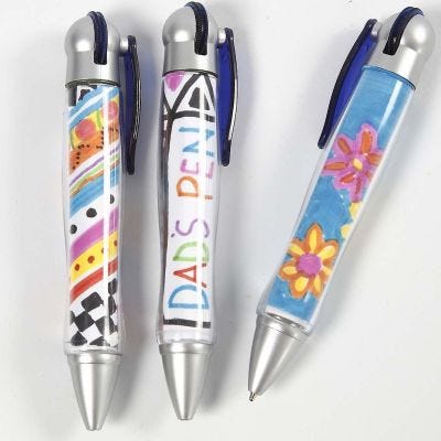 Pens with Drawings under a transparent Cover