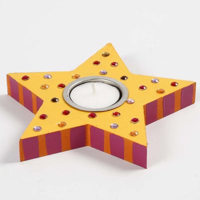 A painted Tea Light Candle Holder
