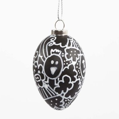 A black Egg with white Doodle Drawing