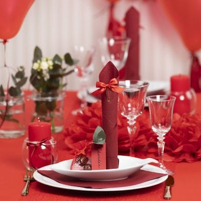 Red Table Decorations with Paper Flowers
